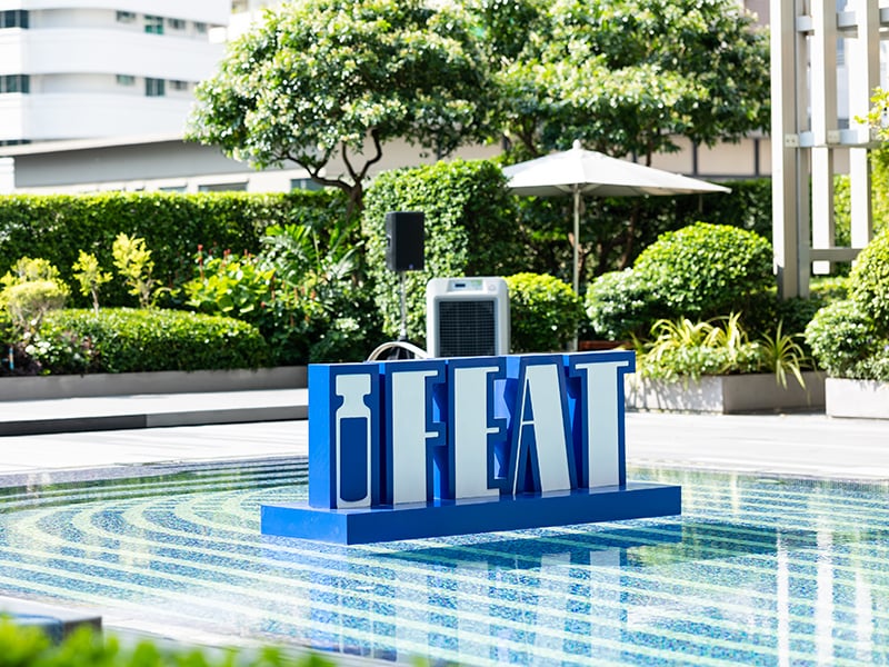 IFEAT logo floating in pool